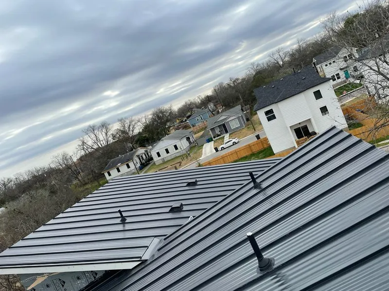 Standing seam metal roof panels with vents for Skylight Repair in Weslaco